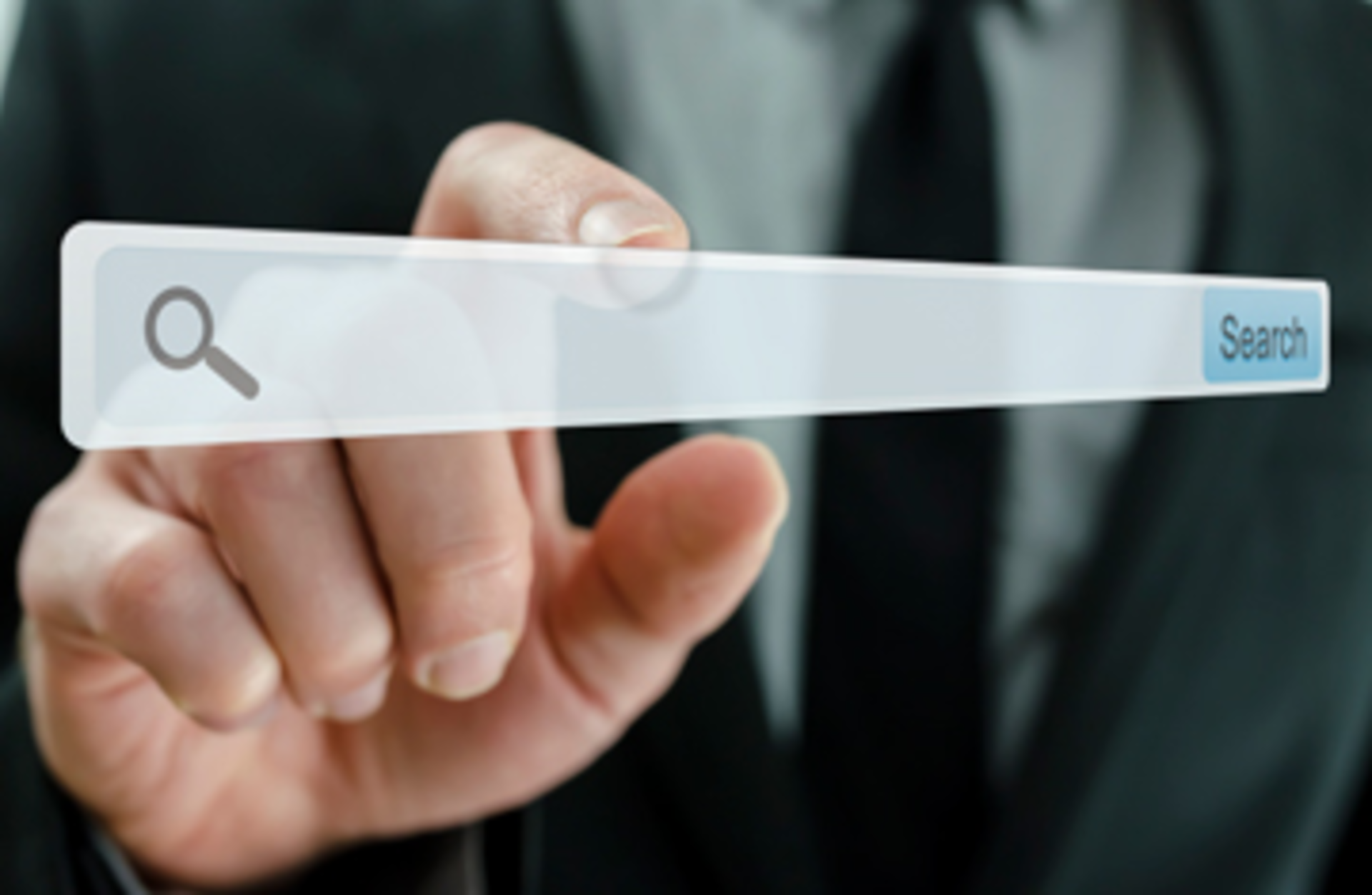Businessman pointing at search bar