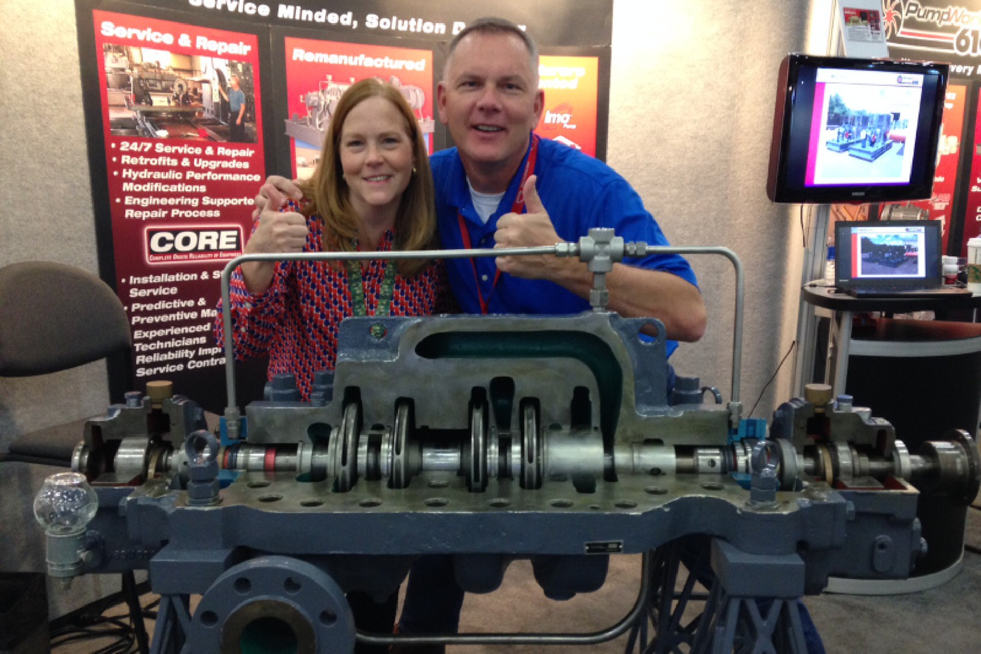 Editor Lori Ditoro and Best Pump Works&rsquo; Andy Martin during the 2015 Pump & Turbomachinery Symposia at the Best Pump Works/PumpWorks 610 booth