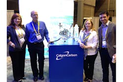 Image 1. The Water Technology and Calgon Carbon teams pose in front of the Calgon booth during WEFTEC 2015.