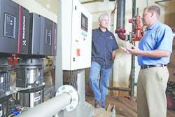 Phil Boyd, chief building engineer of Martin Selig Real Estate (left), talks with Corey Rasmussen, Grundfos Northwest service sales manager. All graphics courtesy of Grundfos. Phil Boyd, chief building engineer of Martin Selig Real Estate (left), talks with Corey Rasmussen, Grundfos Northwest service sales manager. All graphics courtesy of Grundfos.