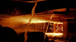 End of continuous casting process for steel showing the solid steel being cooled by water | Image courtesy of Greenshoots Communications/Alamy