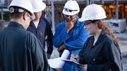 Image courtesy of kali9/iStock: Manufacturer workers plan new project.