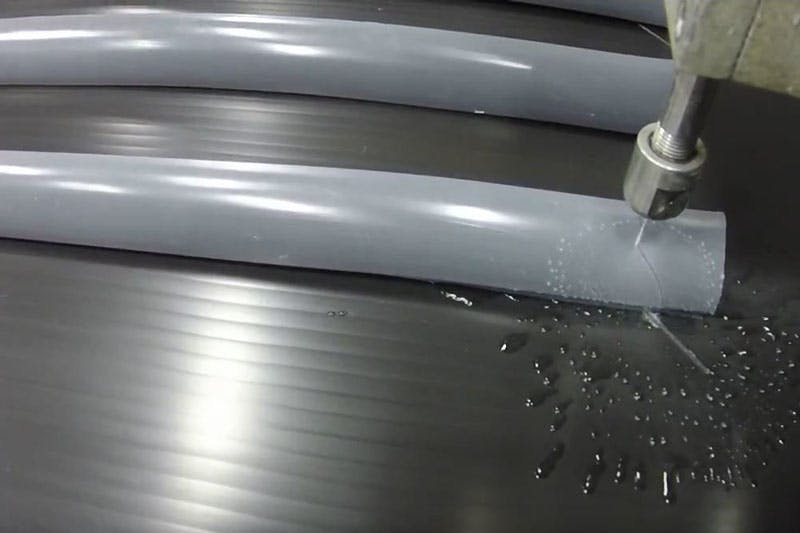 Water-jet cutting does not require expensive metal tooling and makes precise holes for fastener heads.