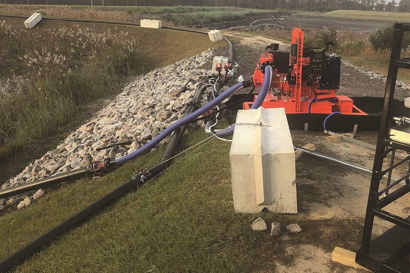 Godwin diesel powered pump is used to remove ash pond water from clear pond and pump to outfall with Xylem pretreatment control system, ensuring that the water being discharged meets site permit limits.