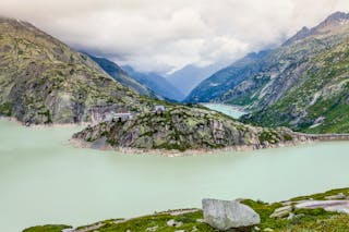 Water dam of Kraftwerke Oberhasli AG in Lake Grimsel in Switzerland.