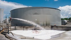 Using hot water to melt dry fertilizer into liquid to be used in custom blending. Using hot water to melt dry fertilizer into liquid to be used in custom blending.