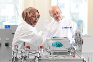 Rawwater project technicians work in one of the company's pressurized bioreactor suites.