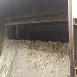 Grease on backplate of screen. Grease on backplate of screen.