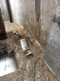 Sand and other debris left in the screen chamber after sinkhole. Sand and other debris left in the screen chamber after sinkhole.