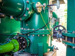 Self-cleaning filtration system in combined-cycle cogeneration power plant. Self-cleaning filtration system in combined-cycle cogeneration power plant.