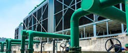 Idle pipes in large industrial cooling towers could be a hotspot for Legionella growth. Following proper disinfection guidelines to clean pipes is key to opening back up safely.