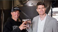 Jason Carvalho President & CEO of BarrelHouse Brewing and Dr. David Stuckenberg COO & Board Vice Chairman of Genesis Systems celebrate the partnership. Jason Carvalho President & CEO of BarrelHouse Brewing and Dr. David Stuckenberg COO & Board Vice Chairman of Genesis Systems celebrate the partnership.