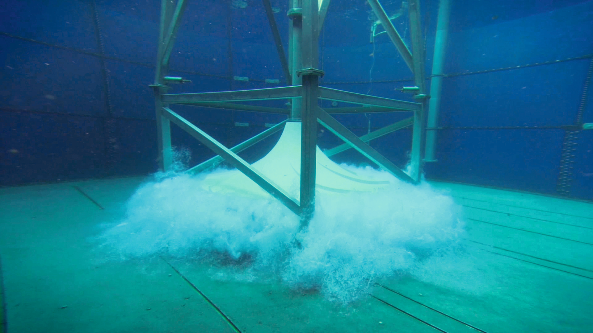 The HYPERCLASSIC Mixing and Aeration System operating inside a tank.