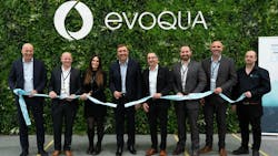 Evoqua team cutting the ribbon at the grand opening event (L-R): Steffen Lange, VP and General Manager of Evoqua&apos;s Disinfection Division, Phil Walsh, Plant Manager, Kelly Van Marle, Senior Quality Control Technician, Ron Keating, Chief Executive Officer, Herv&eacute; Fages, Executive Vice President and Applied Product Technologies Segment President, Sean Zyra, Sr. Director of Manufacturing Engineering and Quality, Frans Conradie, Operations Director, and Dave Robinson, Warehouse Supervisor.