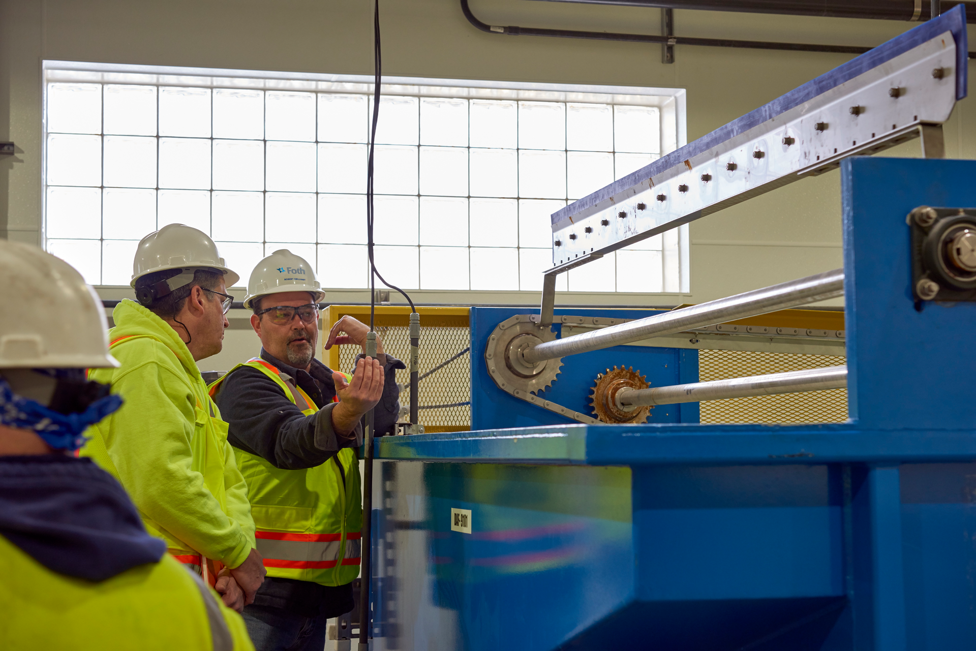 Foth's Rob Brillhart, right, at a Wisconsin wastewater treatment facility.