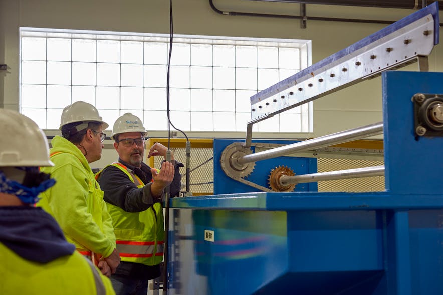 Foth&apos;s Rob Brillhart, right, at a Wisconsin wastewater treatment facility.