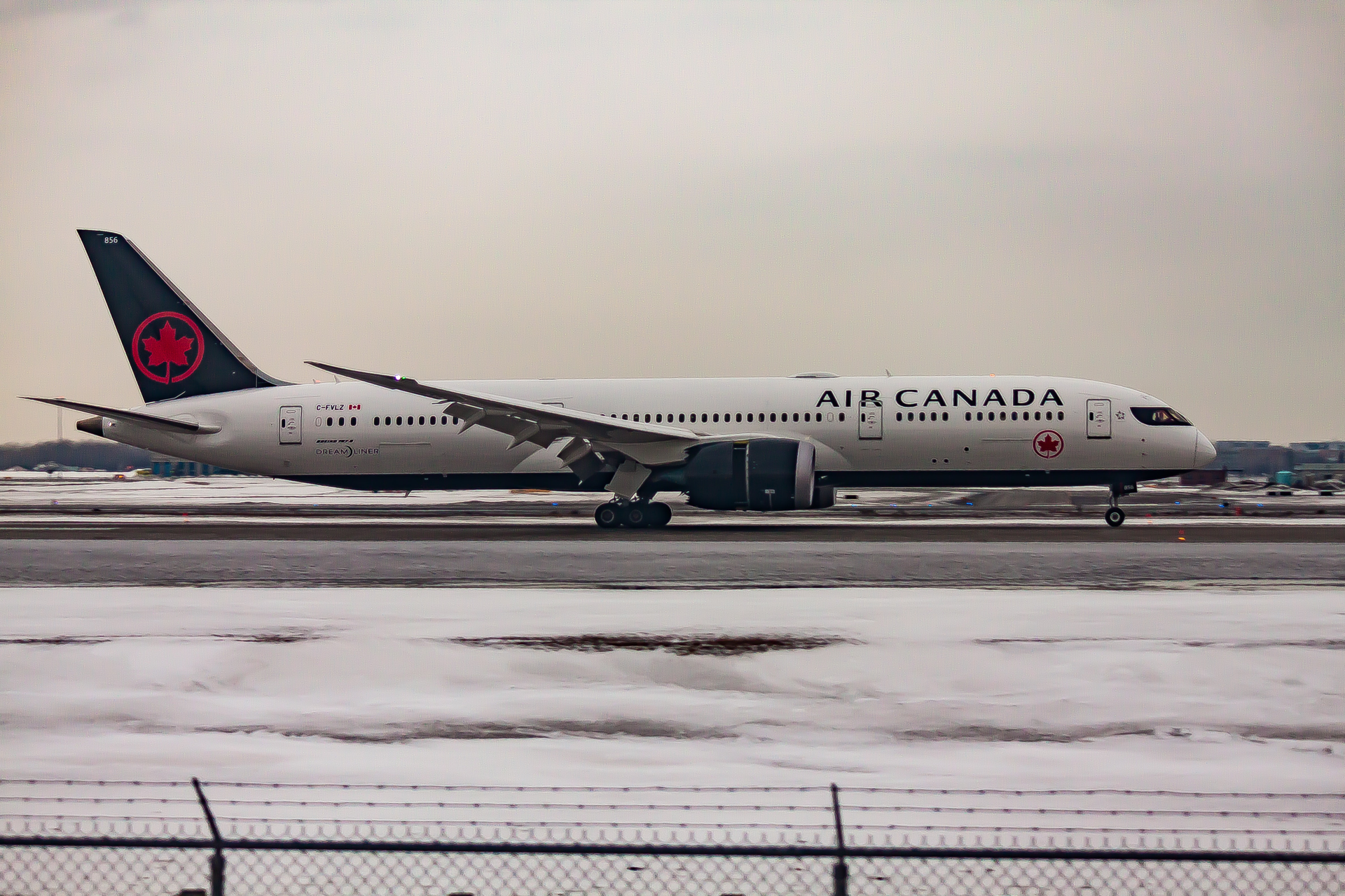 Figure 1 A plane takes off during a snowy day at Seattle-Tacoma International Airport.