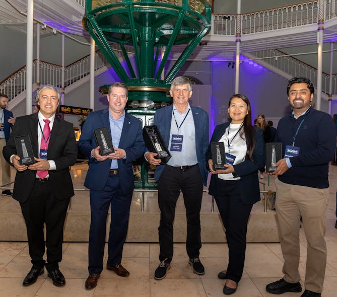 Group picture of 2023 Lighthouse Award winners. From left to right: Giovanni Annicchiar, Ecopetrol; Ralph Exton, Grundfos; Per Overgaard Pederson, Aarhus Vand ReWater; Molun Zhang, The Coca-Cola Company; and Devesh Sharma, Aquatech International.