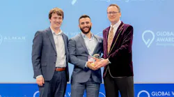 ZwitterCo's Christopher Drover, CTO & co-founder, and Alex Rappaport, CEO & co-founder, accept a Global Water Award from Christopher Gasson, owner of Global Water Intelligence Magazine and award ceremony host.