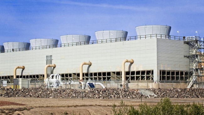 An array of cooling towers at a gas-fired electrical generating plant.