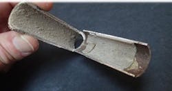 CaCO3 scale in an extracted and bisected heat exchanger tube.2 CaCO3 scale in an extracted and bisected heat exchanger tube.2